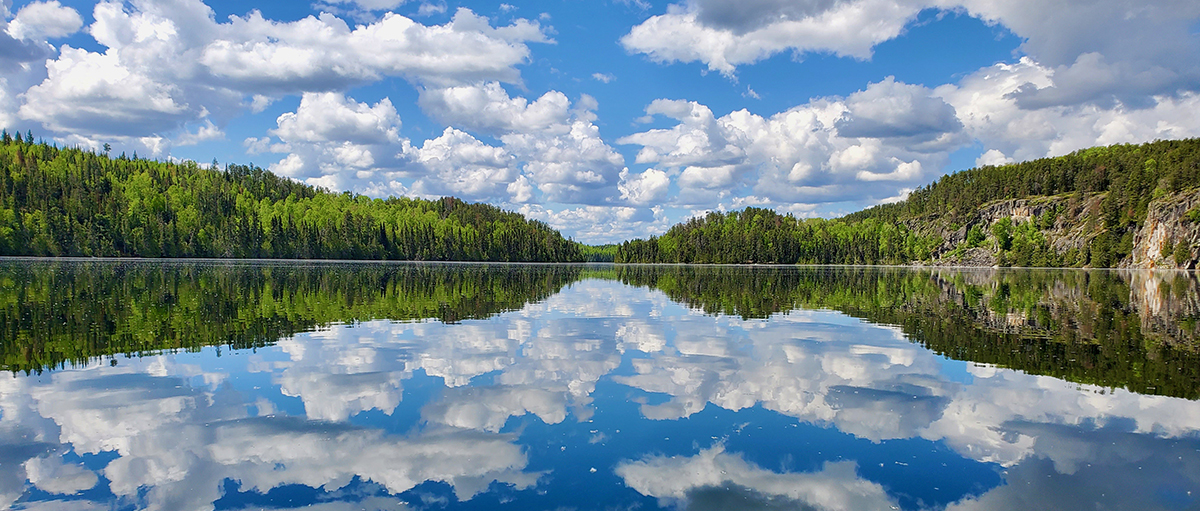 Reflected clouds and lake